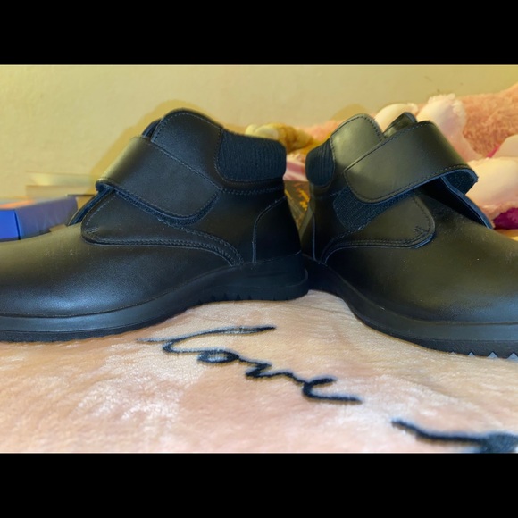 WATER RESISTANT BOOTS - Picture 1 of 3